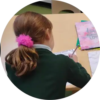 Student focused at desk